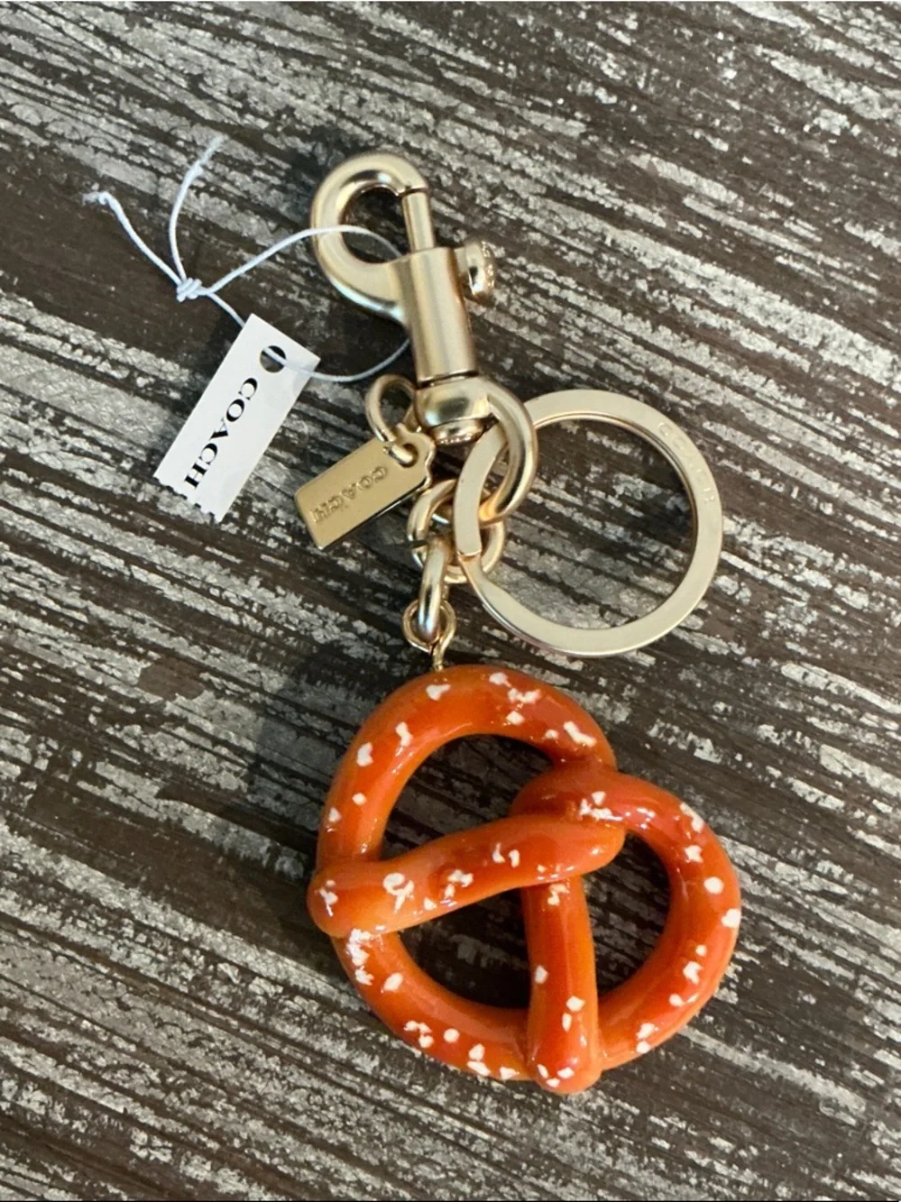 Coach Orange Pretzel Charm Keyring/Bag charm with Gold Hardware. Dusty Included
